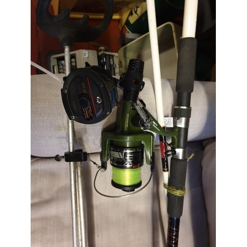 158 - Abu Garcia Commodore Beach Rod and Reel along with Rod Rest.