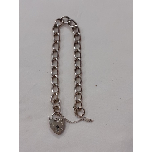 472 - Heavy Set Silver Bracelet with Marked 'Silver' Heart Lock.