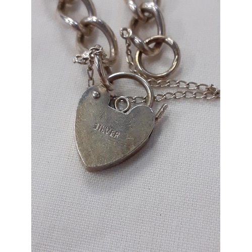 472 - Heavy Set Silver Bracelet with Marked 'Silver' Heart Lock.