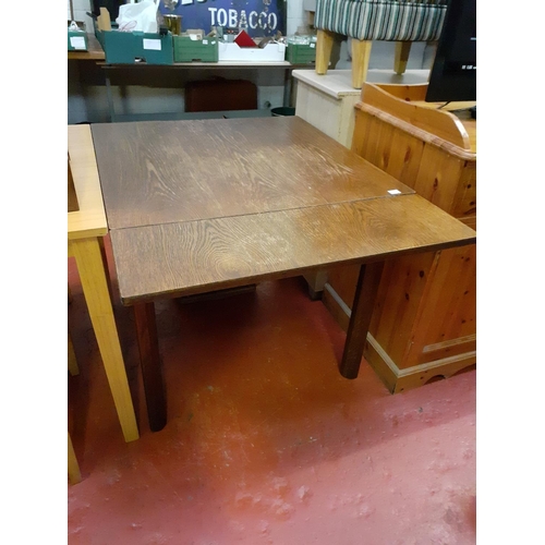 630 - Oak Drawer Leaf Extending Table.