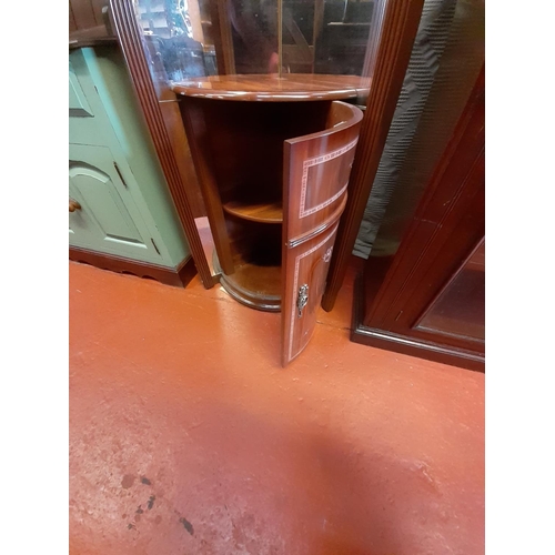 652 - Mirror Backed Mahogany Corner Cabinet with Light over Drum Cupboard Base.