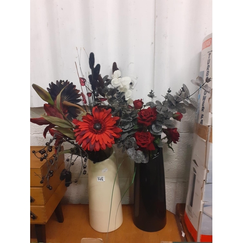 148 - Cream Vase & Similar Black Vase with Artificial Floral Displays.