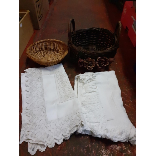 15 - Two Wicker Baskets & Vintage Table Cloths.