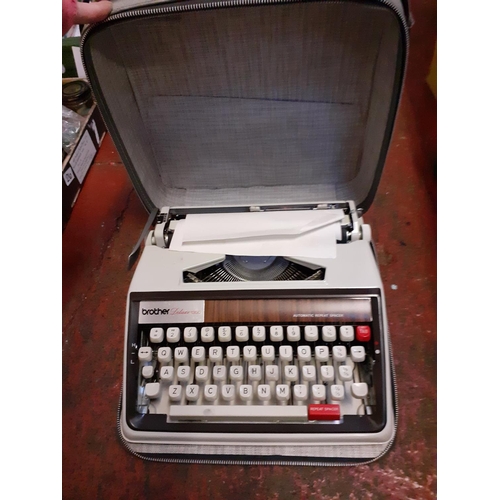 22 - Vintage 1960's Brother Deluxe 1350 Typewriter in Case.