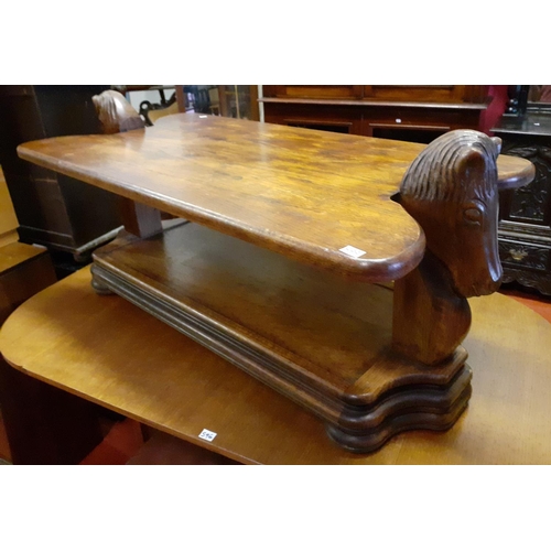 595 - Solid Oak Two Tier Coffee Table with Horse Head Carvings Either End.