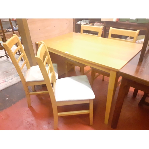 613 - Pine Effect Rectangular Dining Table wit Four Matching Ladder Back Chairs.