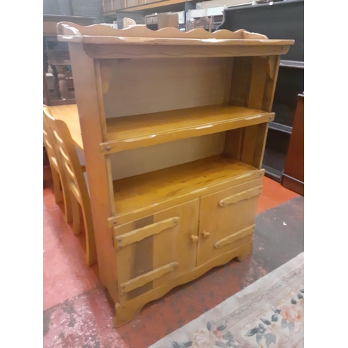 614 - Pine Two Shelf Bookcase with Cupboard Beneath.