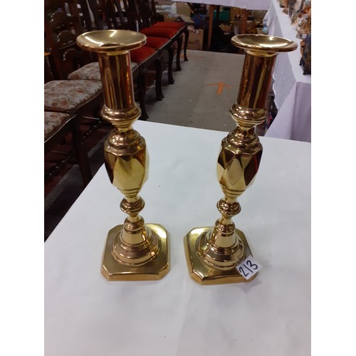 213 - Pair of Tall Brass Candlesticks.