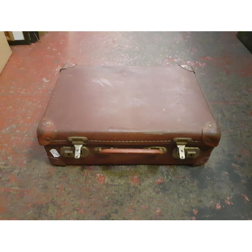 58 - Small Brown Leather 'Python' Vintage Travel Case and Net Curtain.