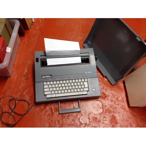 121 - 'Smith Corona' SL460 Portable Electric Typewriter in Case - working.