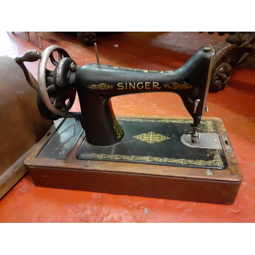 130 - Vintage Singer Sewing Machine in Oak Case.