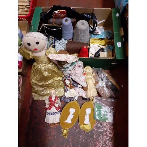 18 - Box to Include Dolls, Shoe Shine Kit, Yarn Spools, Capodimonte Wall Plaques etc.