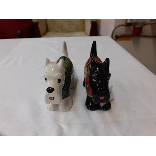 304 - Pair of Clay Art Scottie & Westie Dog Salt and Pepper Pots.