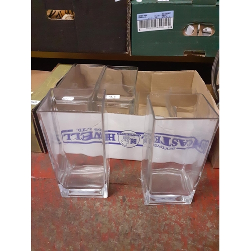 31 - 8 Matching Rectangular Glass Vases.