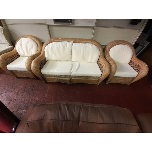 481 - Solid Wicker Three Piece Conservatory Suite with Drawers Under Each Seat and Cream Cushions.