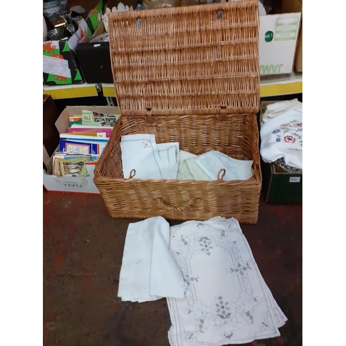 55 - Woven Wicker Basket & Selection of Linen.