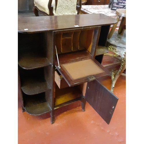 561 - Dark Oak Drop Front Writing Bureau with Shelves Either Side, Single Drawer & Single Cupboard.