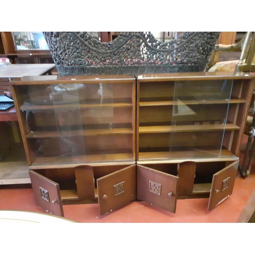 563 - Pair of Mahogany Sliding Glazed Door Bookcases over Double Cupboards.