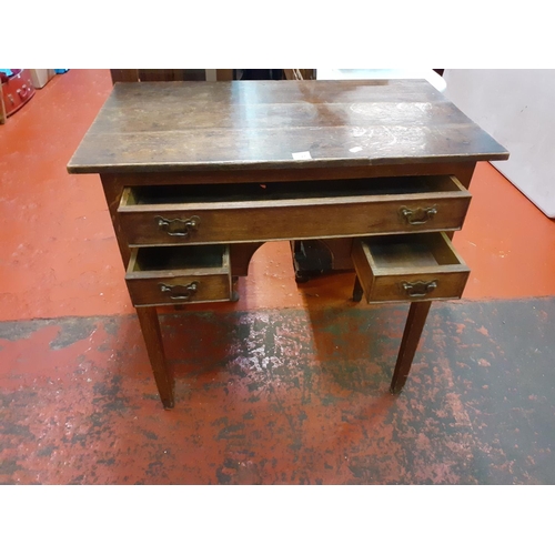 590 - 3 Drawer Oak Knee Hole Desk.