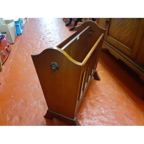 591 - Teak Magazine Rack with Brass Lion Handles.