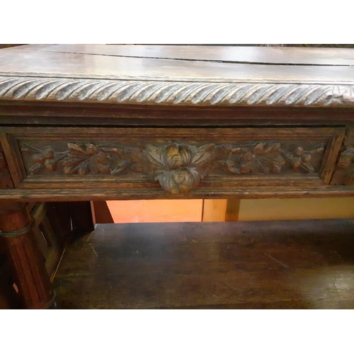 599 - 19th Century Carved Oak Three Tier Buffet with Two Drawers and Lift Top.