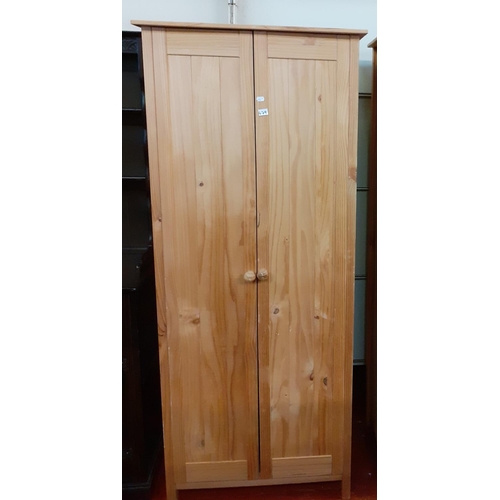 479 - Small Pine Double Wardrobe with Hanging Rail.