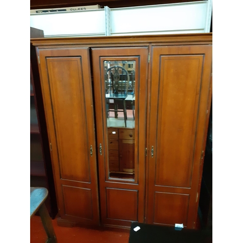 481 - Mahogany Triple Wardrobe with Mirrored Central Door, Double Hanging Rail & Shelves.