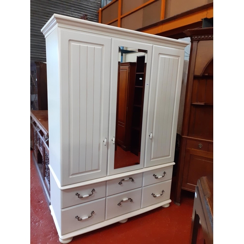 484 - Modern, Off-White Solid Triple Wardrobe on Six Drawer Base with Mirrored Central Door and Double Han... 