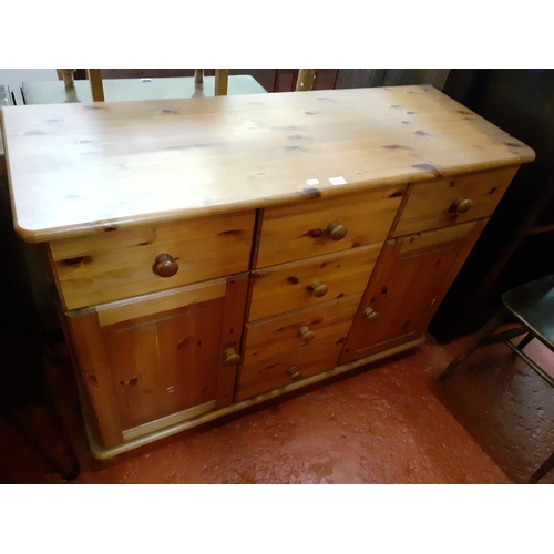 487 - Solid Pine Six Drawer Sideboard with Double Cupboard.