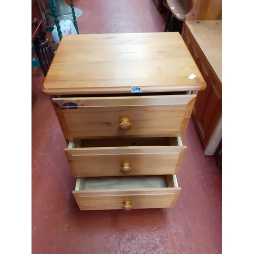 569 - Three Drawer Solid Pine Bedside Cabinet.