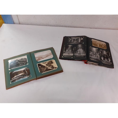 208 - Two Albums of Vintage Postcards.