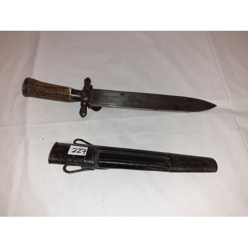 227 - German Hunting Dagger with Clam Shell Hilt in Scabbard.