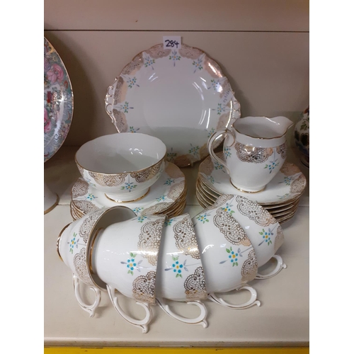 284 - 20 Piece Hand Decorated Roslyn China Tea Set.