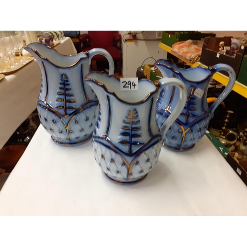 294 - Set of Three Flo Blue & White Dresser Jugs.