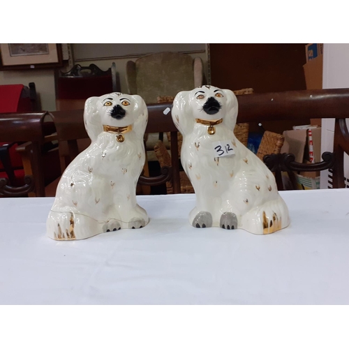 312 - Pair of Beswick Spaniels no 1378-5 - one has crack at base.