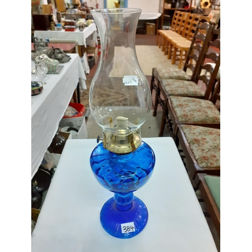 384 - Blue Glass Based Single Burner Oil Lamp with Chimney.