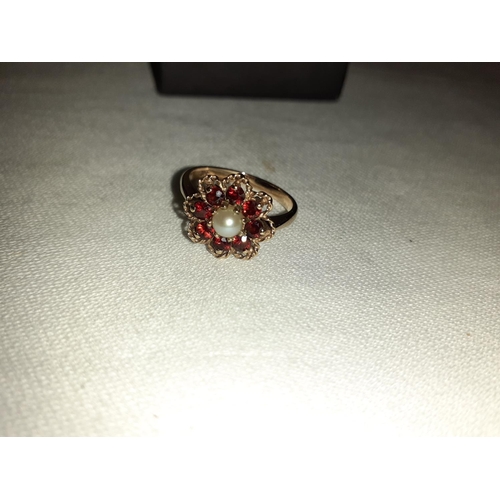 442 - 9ct Gold Ruby & Pearl Daisy Ring Size O.