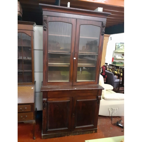 492 - Tall Mahogany Glazed Top Bookcase with Double Cupboard and Secret Drawer.