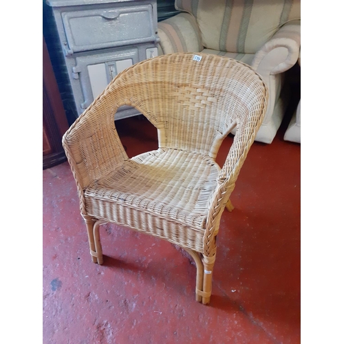 534 - Wicker Carver Chair.