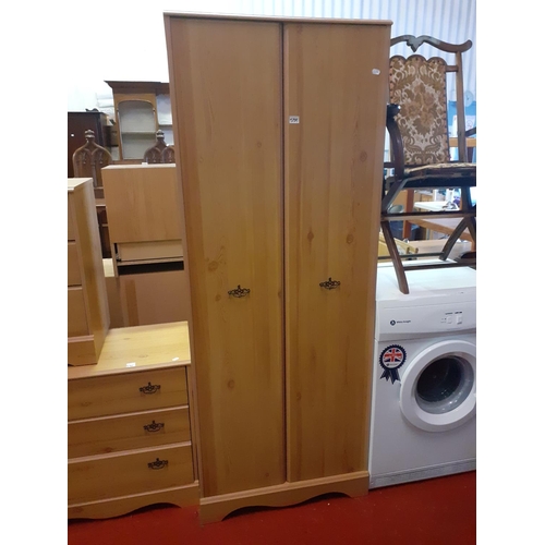 539 - Two Door Pine Effect Double Wardrobe.