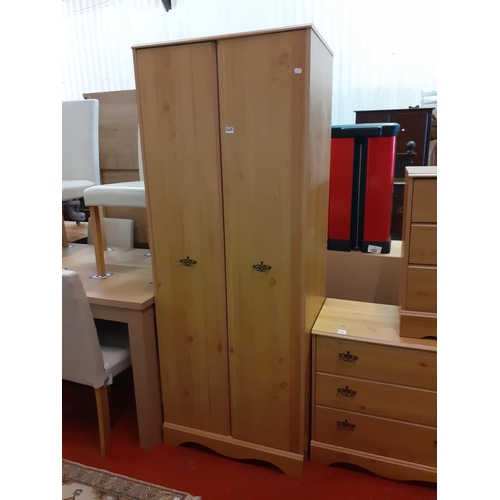 543 - Two Door Pine Effect Double Wardrobe with Hanging Rail.