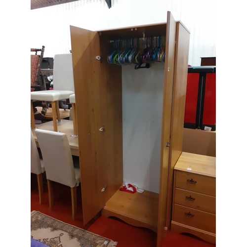 543 - Two Door Pine Effect Double Wardrobe with Hanging Rail.