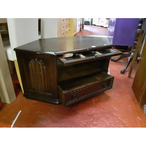 548 - Dark Oak Corner TV Cabinet with Glazed Slide Away Cupboard Door.