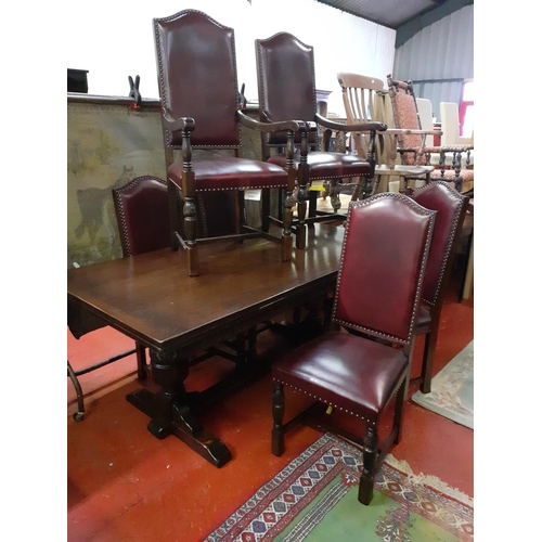 550 - Large Extendable Oak Refectory Table with Four Matching Leather Chairs & Two Carvers.