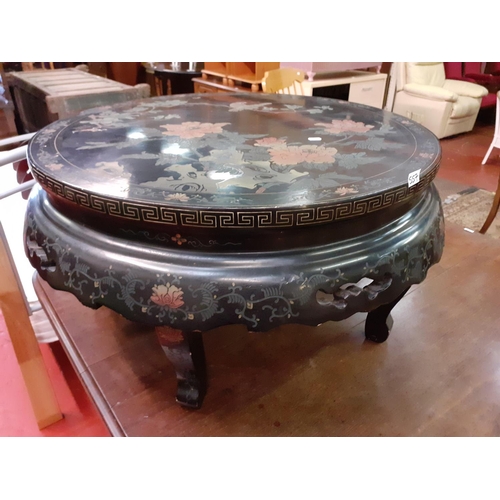 557 - Circular Hand Painted Oriental Table with Floral & Bird Design.