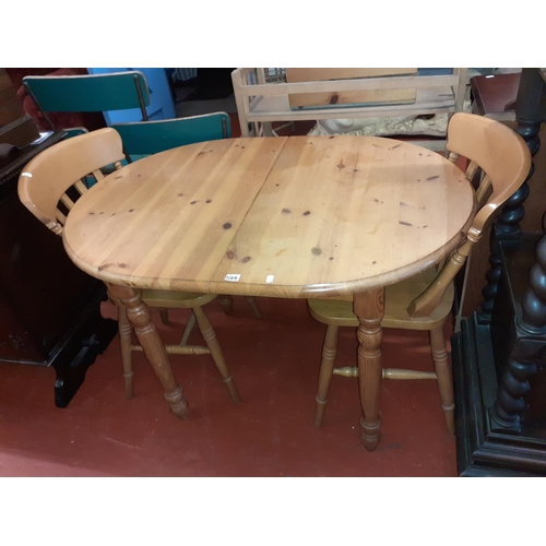 588 - Oval Solid Pine Table with Two Matching Chairs.