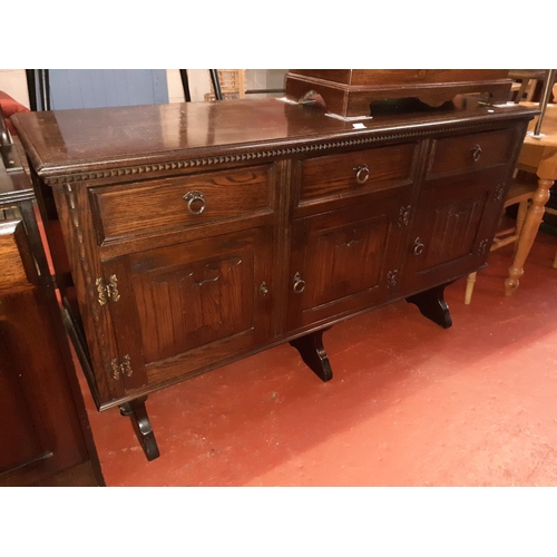 591 - Solid Oak Three Drawer, Three Door Sideboard.