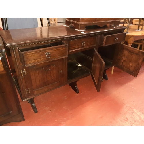 591 - Solid Oak Three Drawer, Three Door Sideboard.