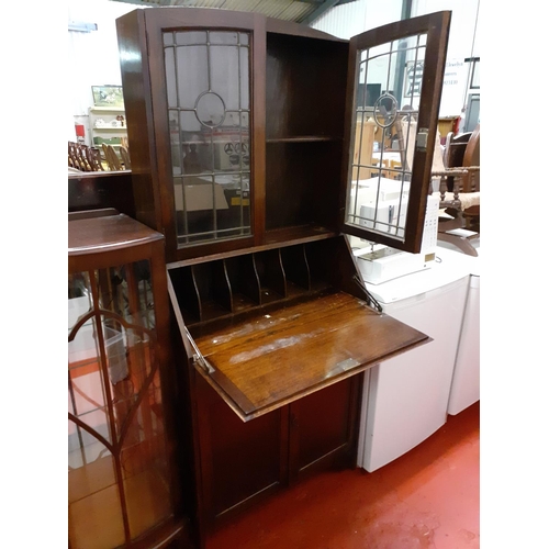 607 - Oak Glazed Top Bureau Bookcase with Drop Front Over Single Drawer and Double Cupboard.