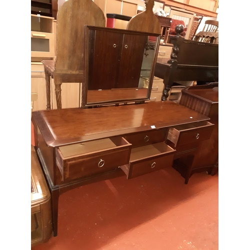 619 - Stag, Six Drawer Dressing Table with Mirror.